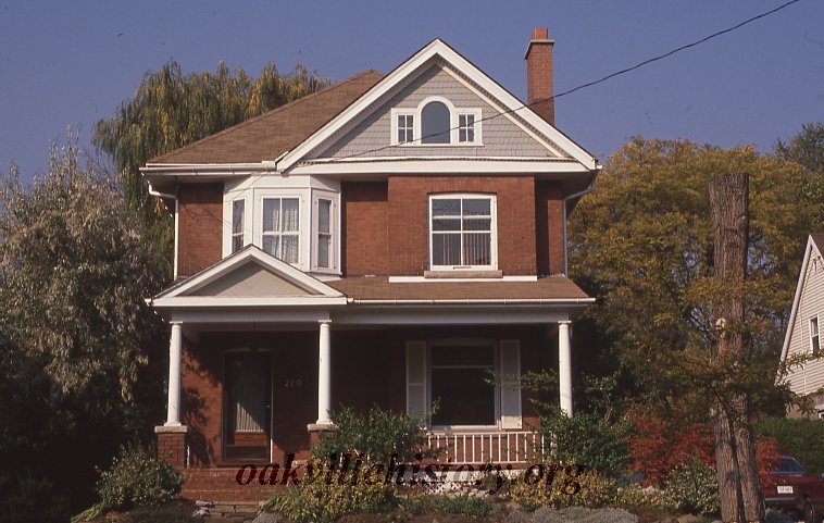 Three story house in summer