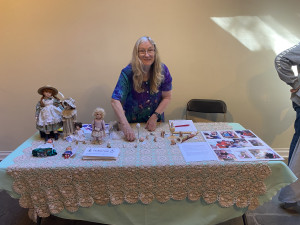 Tradition Dolls vendor with dolls on table