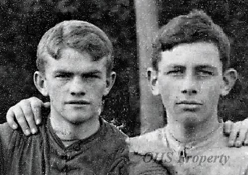 Black and white headshot photo of two men